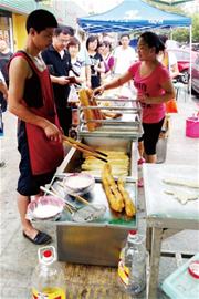 油條精色誘食客 吃多致腦殘